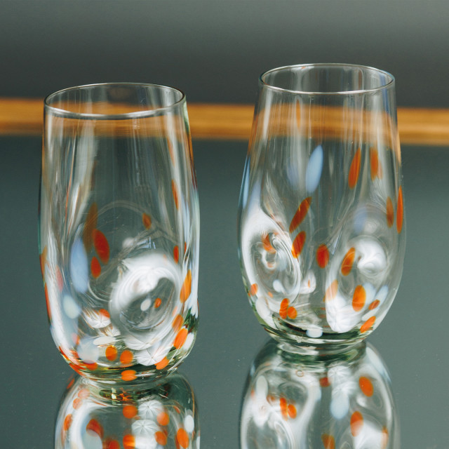 Ngwenya Glass Flecked Organic Highball Tumblers, Set of 4 - Orange on the table