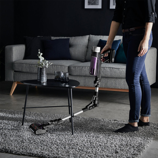 Rowenta 9.60 Allergy Model Cordless Stick Cleaner X-Force Vacuum Cleaner on a rug