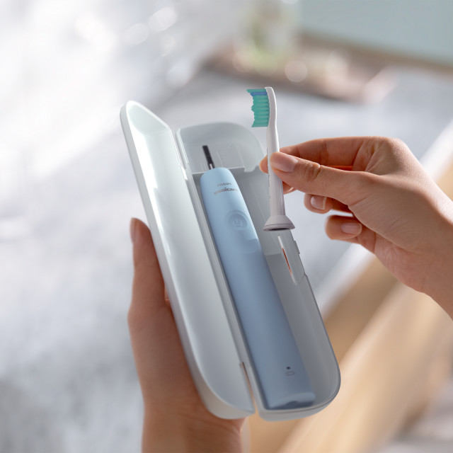 Philips 2100 Series Rechargeable Sonicare Electric Toothbrush in a travel case