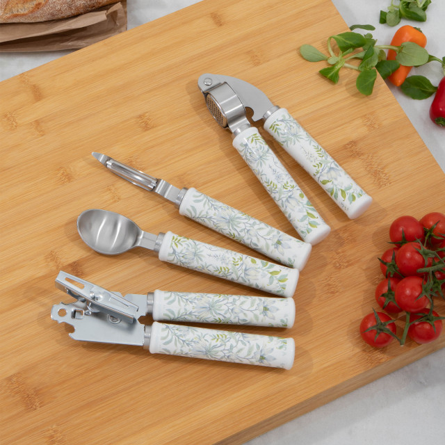 Laura Ashley Stainless Steel Ice Cream Spoon with Ceramic Handle - Sage Parterre on a chopping board