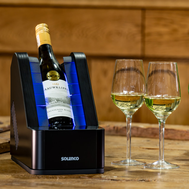 Solenco Life Precision Bottle Wine Cooler on the table with a bottle of wine