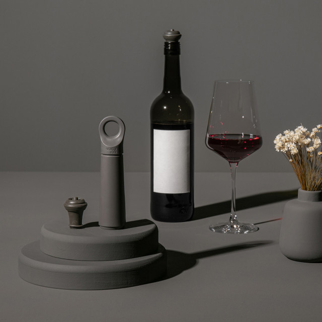 Vacu Vin Wine Saver Loop - Graphite with a bottle of wine