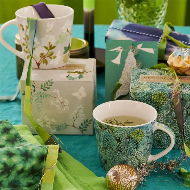 Designers Guild Madhya Azure Mug, 420ml on the table