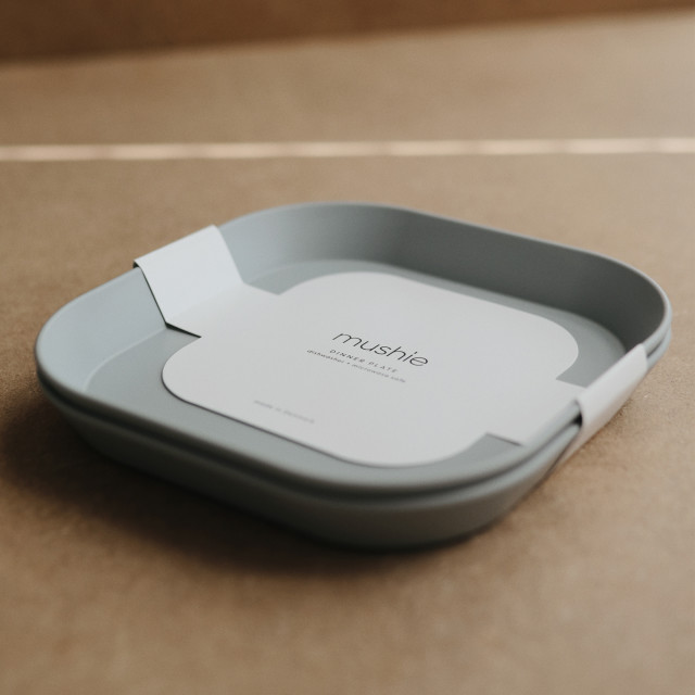 Mushie Square Dinner Plate - Cloud packaging on the table