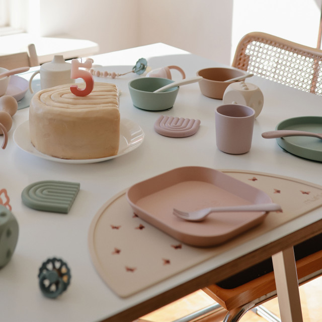 Mushie Square Dinner Plate - Blush on the table