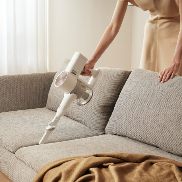 Xiaomi G20 Vacuum Cleaner on a couch