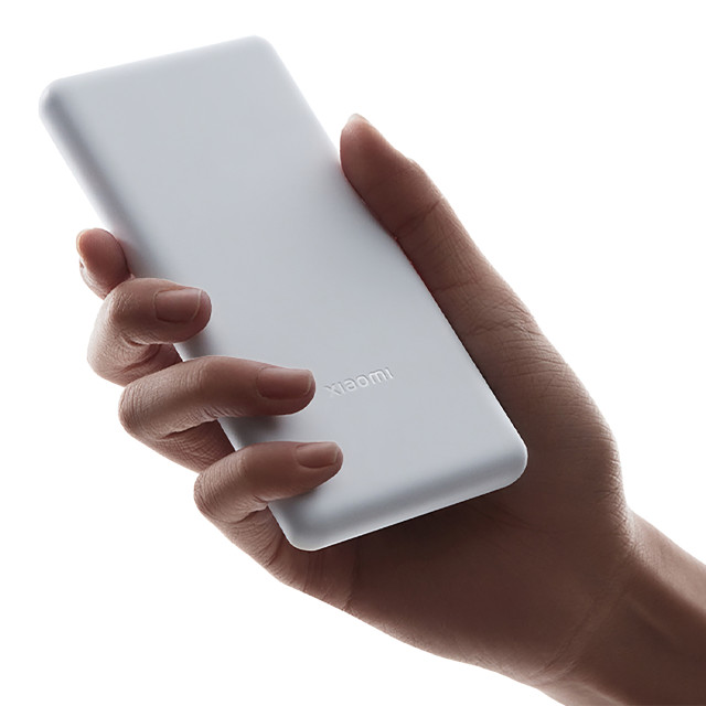 Xiaomi 10000mAh Power Bank Lite, 22.5W handheld showing scale