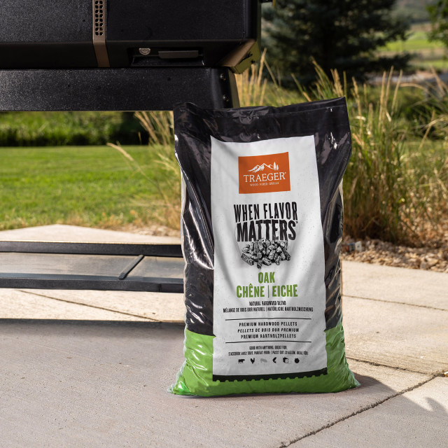 Traeger Oak Pellets, 9kg next to a traeger