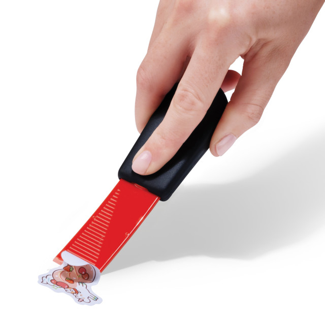 Dreamfarm Self Sharpening Cleaning Scrapers, Set of 2 removing a sticker