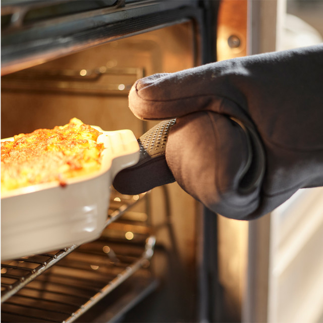 Joseph Joseph Right Hand Pinch Oven Glove with a casserole