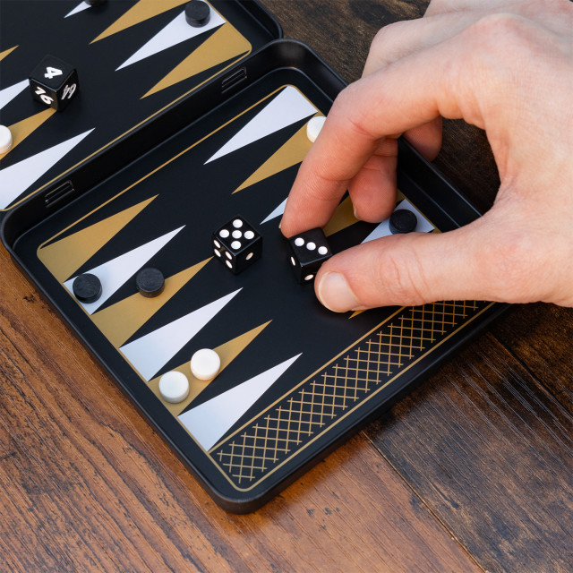 Suck UK Iron & Glory Magnetic Travel Backgammon on the table