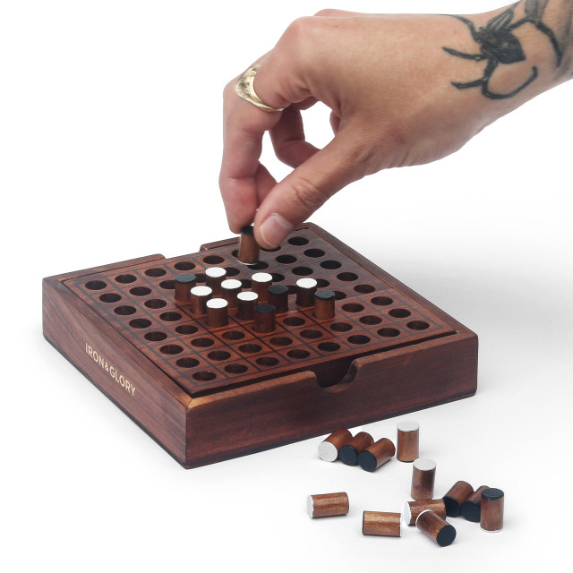Suck UK Iron & Glory Wooden Reversi Game showing scale