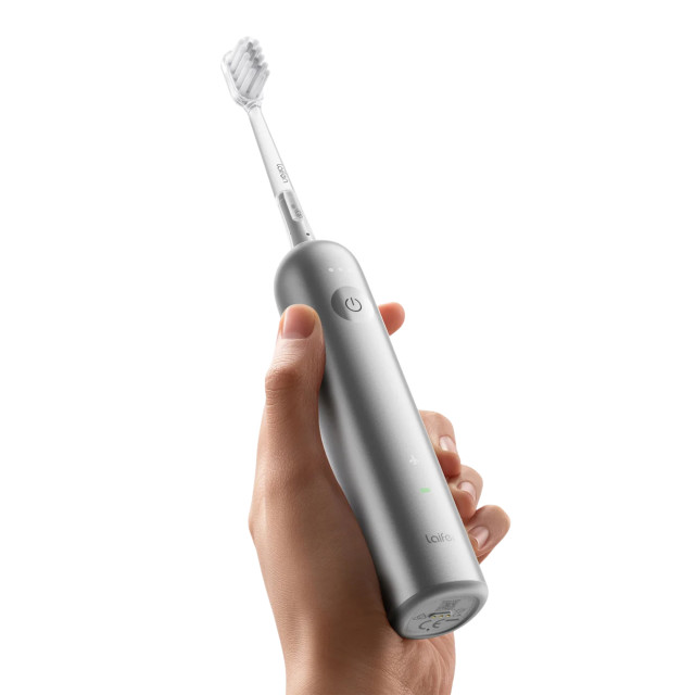 Laifen Wave Electric Toothbrush - Stainless Steel handheld showing scale