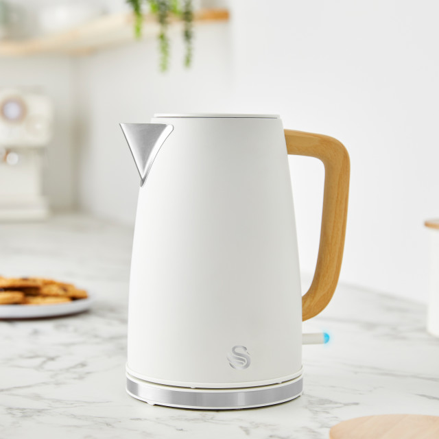 Swan Fjord Rapid Boil Cordless Kettle, 1.7L - White on the kitchen counter