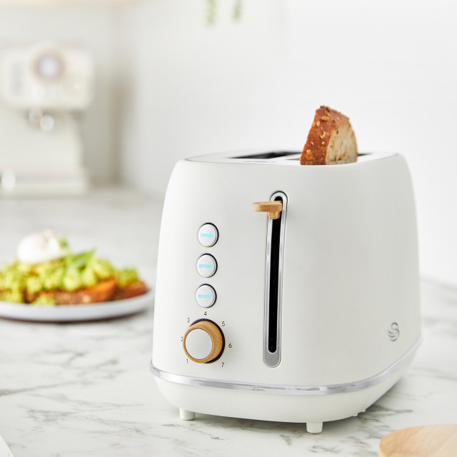 Swan Fjord Electronic 2-Slice Toaster, 800W - White with bread on the kitchen counter