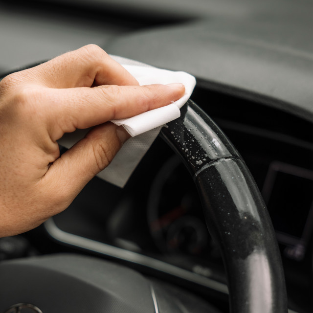 GoodBasics Probiotic On-the-Go Wipes, Pack of 30 wiping the steering wheel