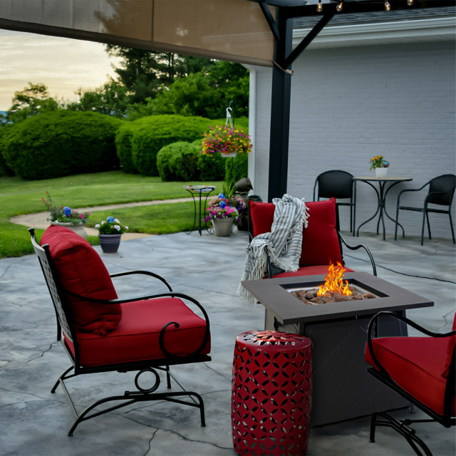Alva Gas Fire Table with Lava Rocks & Lid by the patio