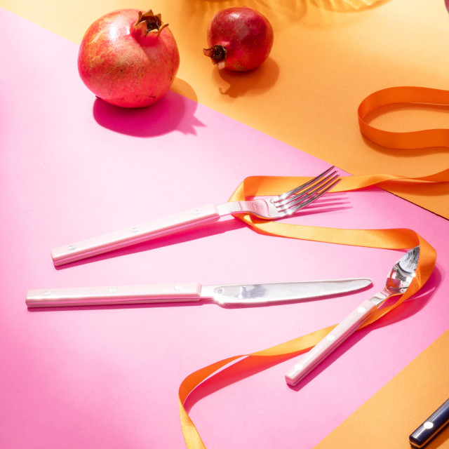 Olivia Princess Stainless Steel Cutlery Set, 16-Piece - Pink on the table