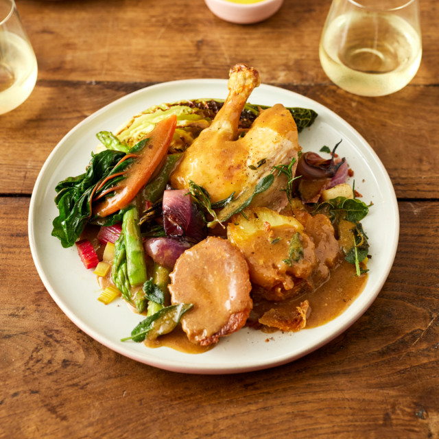 Jamie Oliver Big Love Stoneware Perfect Plates, Set of 4 with food on the table