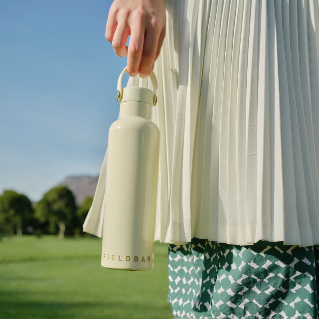 Fieldbar Signature Shades Collection Field Bottle, 750ml - Safari White handheld showing scale