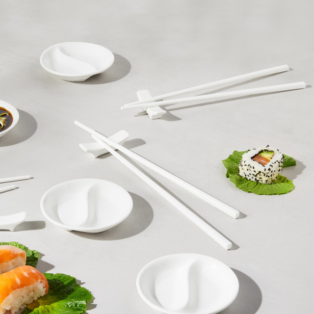 Maxwell & Williams White Basics Porcelain Chopstick Entertainment Set, 12-Piece on the table with food