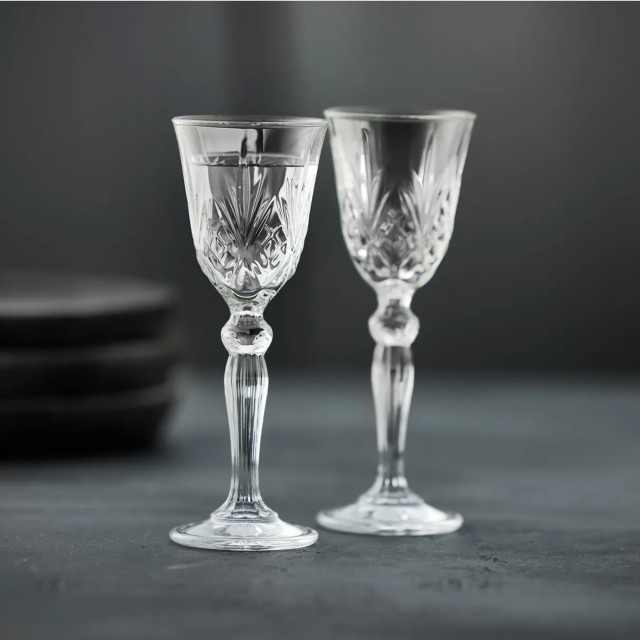 Lyngby Melodia Crystal Shot Glasses, Set of 4 on the table