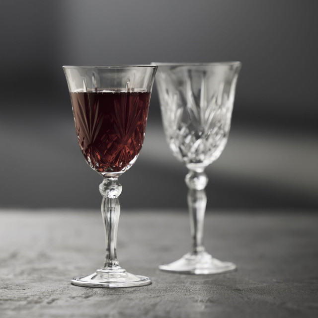 Lyngby Melodia Lead-Free Crystal Red Wine Glasses, Set of 4 with wine on the table