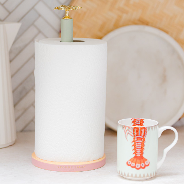 Yvonne Ellen Kitchen Paper Towel Holder next to a mug