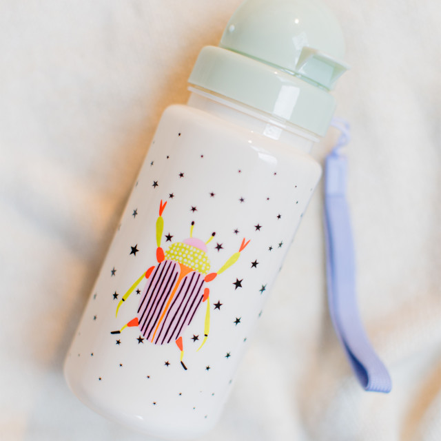 Yvonne Ellen Mini Beetle Bottle, 400ml on a cloth