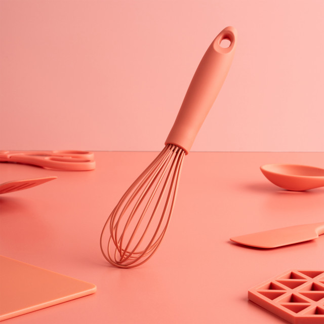 Fusion Twist Silicone Whisk - Coral on the table
