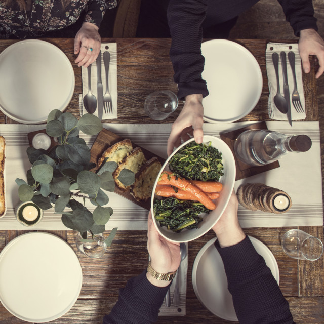 Artisan Street Oval Roaster, 28cm with food on the table