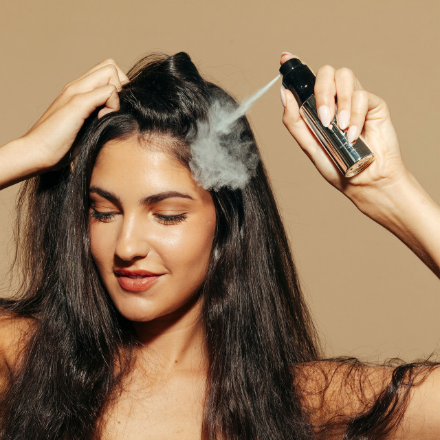 Moyoko Turn Up Volume Powder, 13g sprayed on hair