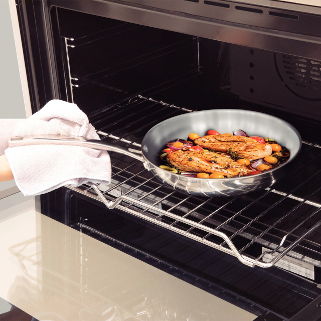 Tramontina Grano Stainless Steel Frying Pan - 20cm with food in an oven