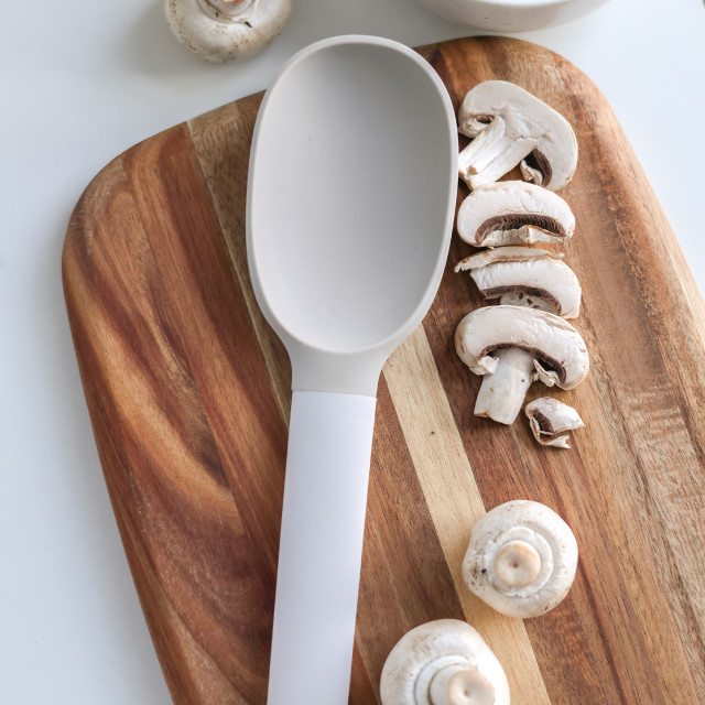 Kitchen Inspire Silicone Solid Spoon on the table