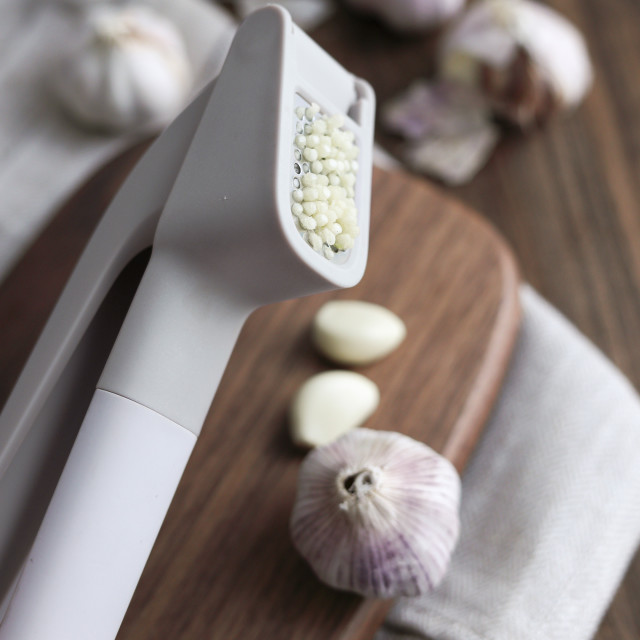 Kitchen Inspire Garlic Press with pressed garlic