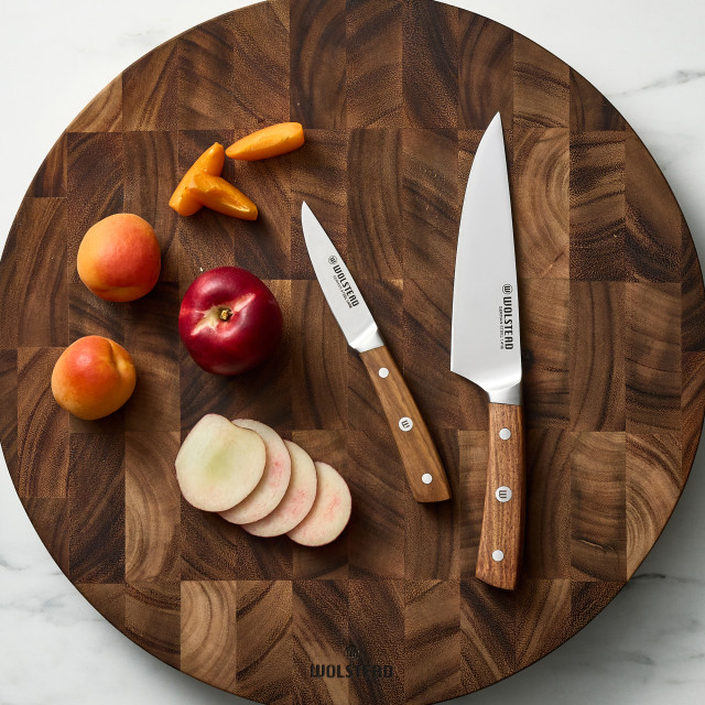 Wolstead Estate Chef's Knife, 16cm on a chopping board