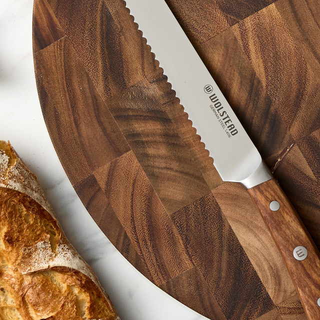 Wolstead Estate Bread Knife, 20cm detail on a chopping board