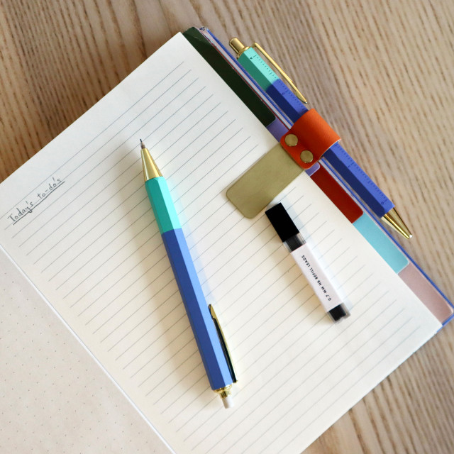 Kikkerland Mechanical Pen & Pencil Set, 2-Piece on an open book