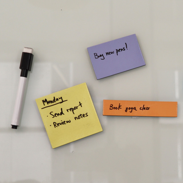 Kikkerland Memo Magnets Set on a white board