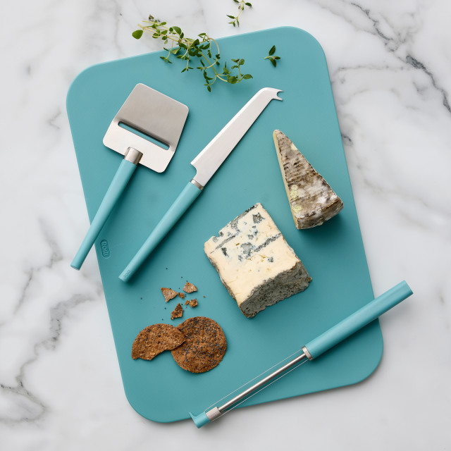 Rosti Emma Cheese Knives Set, 3-Piece - Nordic Green with cheese on a chopping board