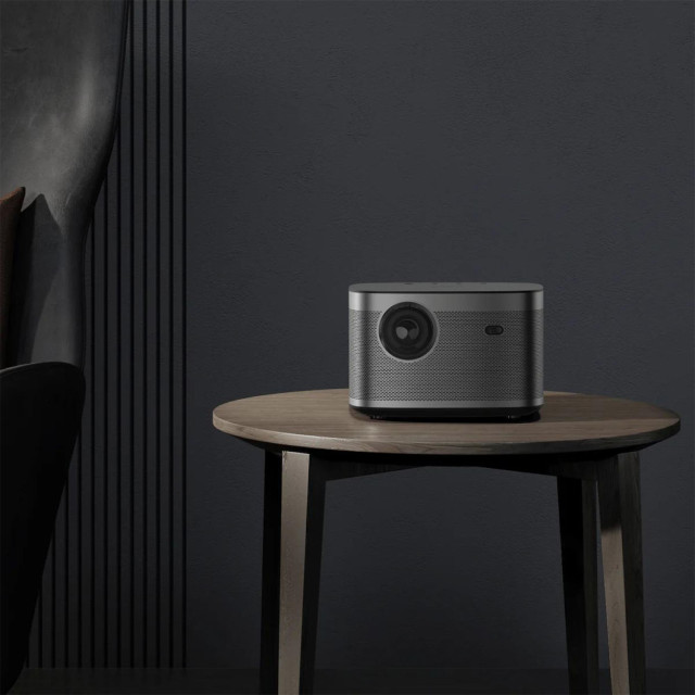 Xgimi Horizon Projector on a chair showing scale