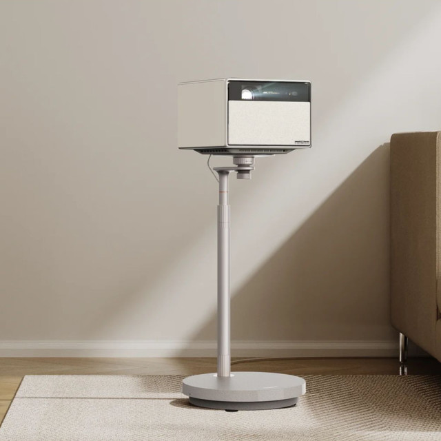 Xgimi Floor Stand for Horizon Projectors next to a couch