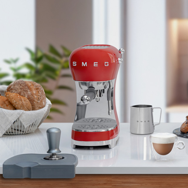 Smeg Retro Manual Espresso Coffee Machine - Fiery Red on the kitchen counter