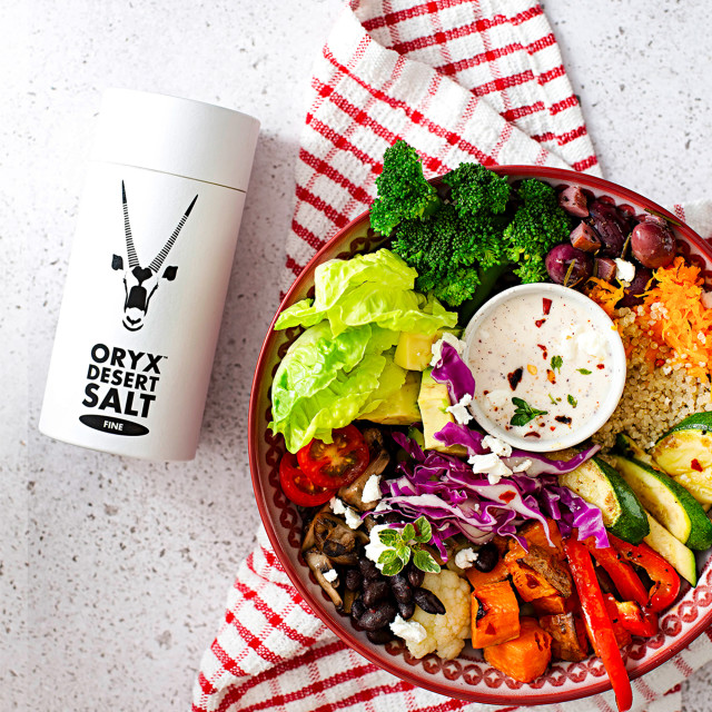 Oryx Desert Salt Fine Oryx Desert Salt in Biodegradable Shaker with a plate of food