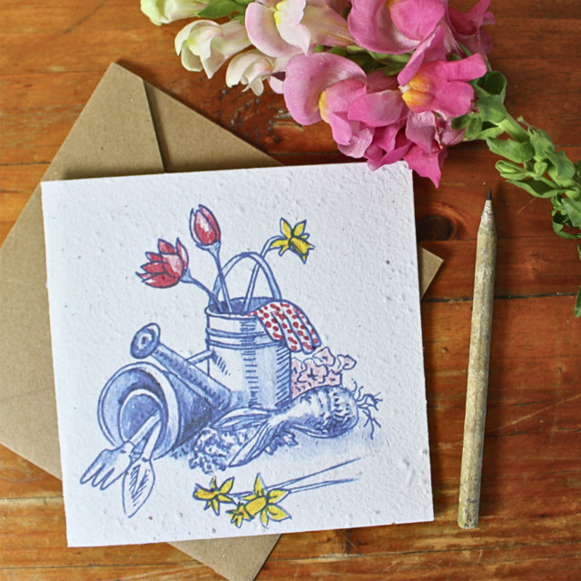 Growing Paper Gardening Greeting Card on the table
