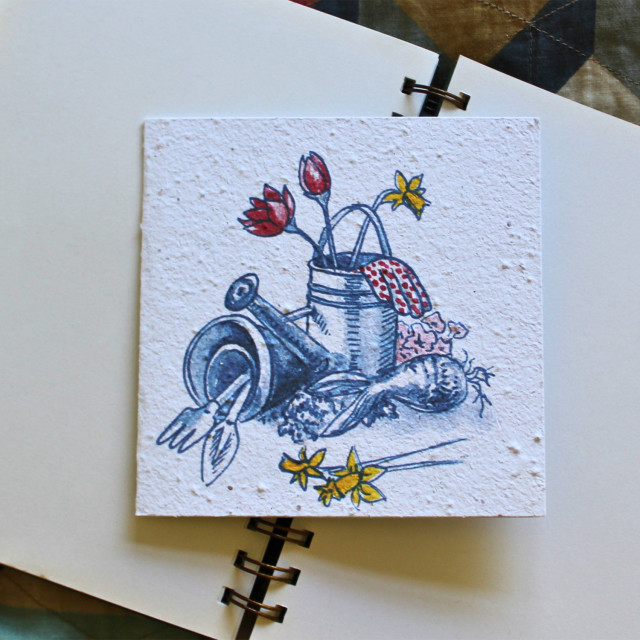 Growing Paper Gardening Greeting Card showing scale on a book