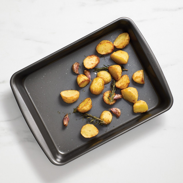 Kitchen Pro Bakewell Roasting Pan, 35cm with roasted potatoes