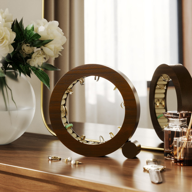 Umbra Ferris Ring Holder - Walnut with rings on a dressing table