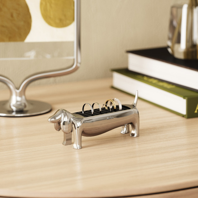 Umbra Dachsie Ring Holder - Chrome with rings on a desk