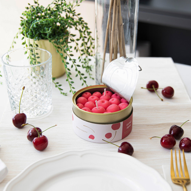 CandleCan Fruity Cherry Scented Candle on a dinner table